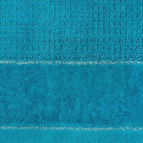 Ręcznik Glory 2 70x140 turkusowy ciemny z welurową bordiurą i srebrną nicią 500g/m2 frotte Eurofirany
